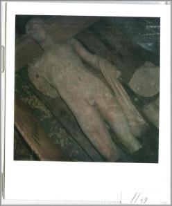 This Polaroid seized from the warehouse of dealer Giacomo Medici shows the Getty Museum's Statue of Apollo shortly after it was looted from a tomb in Southern Italy. 