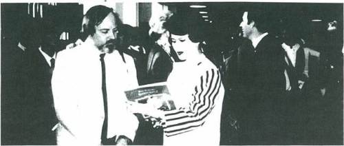 Labbe presents Queen Sirikit of Thailand with a copy  of his monograph,  Ban Chiang: Art and Prehistory of Northeast Thailand, during her visit to Los Angeles.